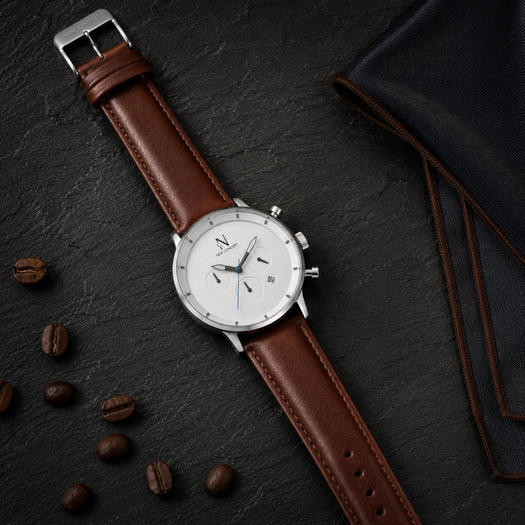 Reloj New Concept LuminX Leather flat lay lifestyle café