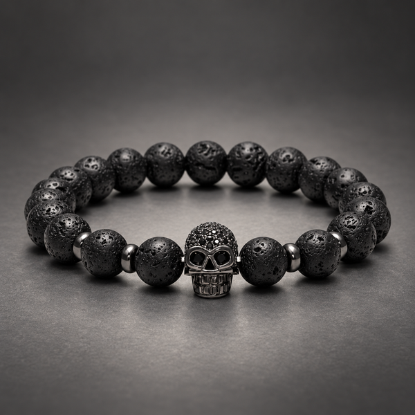 Pulsera Mortem variante Negro con piedras volcánicas de 8 mm y calavera metálica sobre fondo grafito