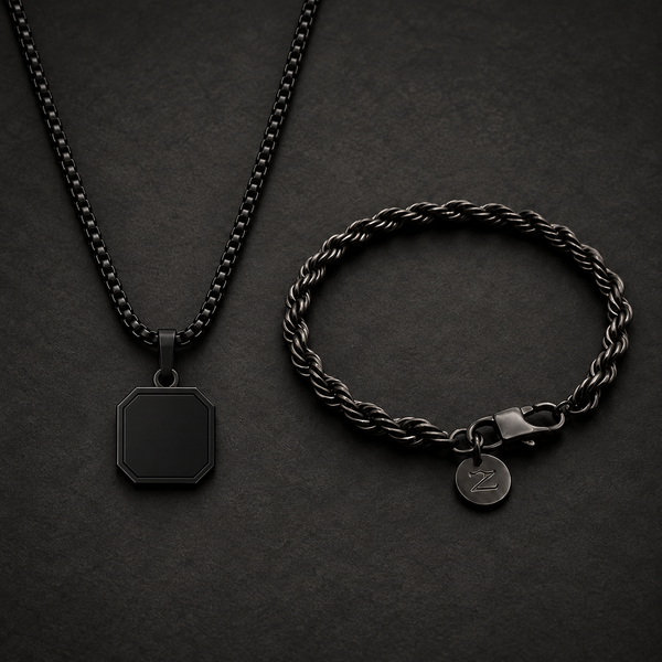 Pack Collar Octavus Black y Pulsera Braid Black 6mm sobre fondo grafito